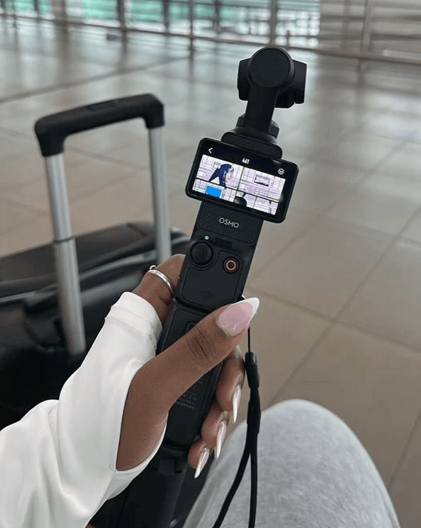 Creator holding camera